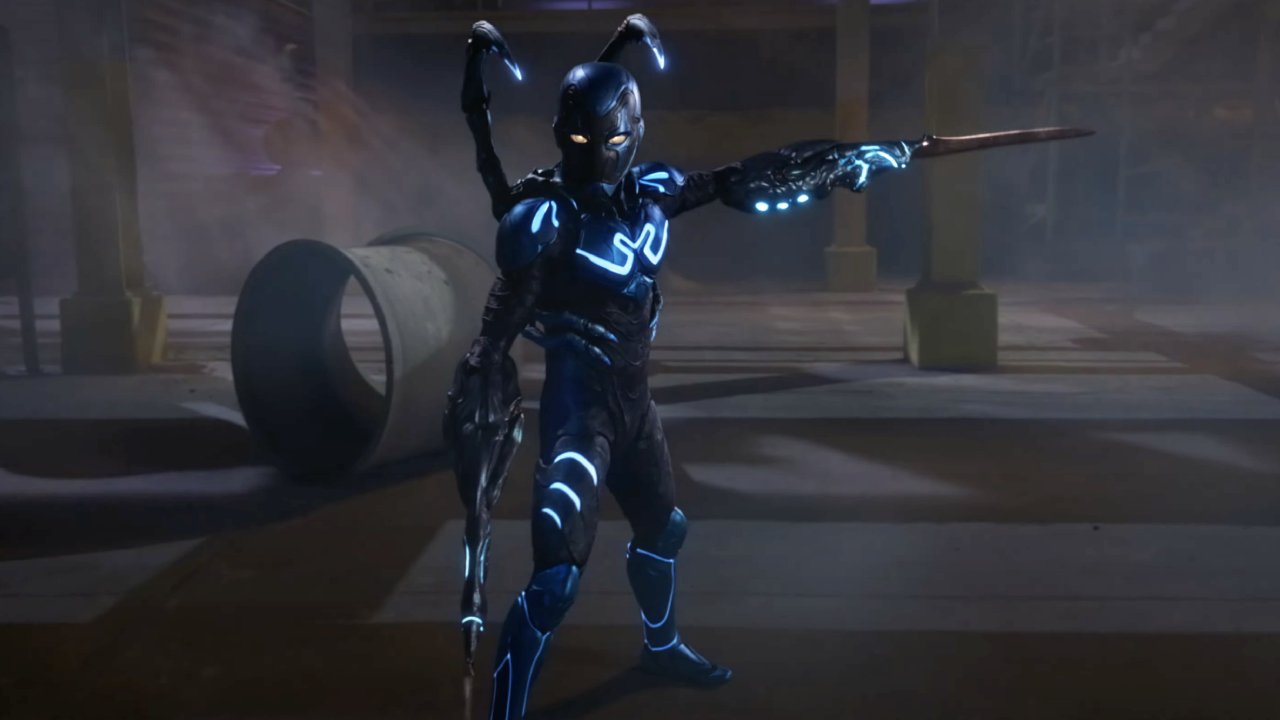 A shot from Blue Beetle depicting Blue Beetle with swords